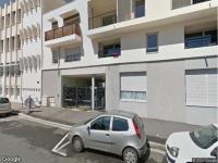 Garage fermé au sous-sol d'un immeuble à louer à Lyon