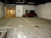 Emplacement de parking couvert à Namur. Accès 24*7 porte motorisée